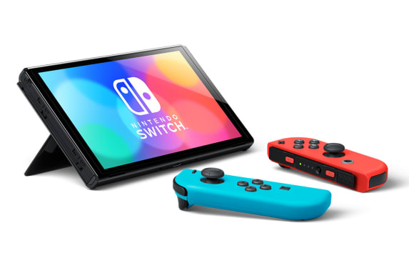 *NINTENDO + PLAYSEAT SPECIAL PRICE £399* NINTENDO SWITCH OLED NEON BLUE & RED